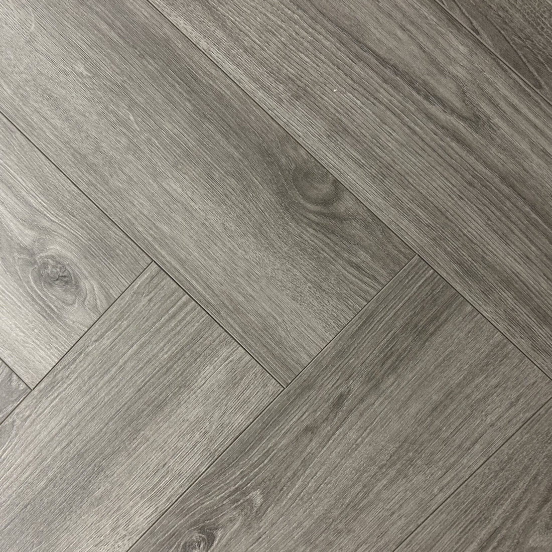 Furlong Manor Ronda Grey Laminate Herringbone 131x643mm