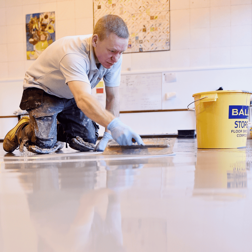 F-Ball Stopgap 1200 smoothing compound being applied with a trowel