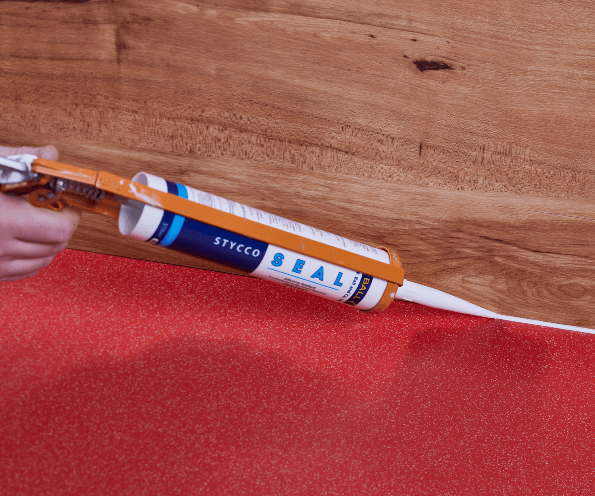 F-Ball Stycco Seal sealing a vinyl floorcovering joint