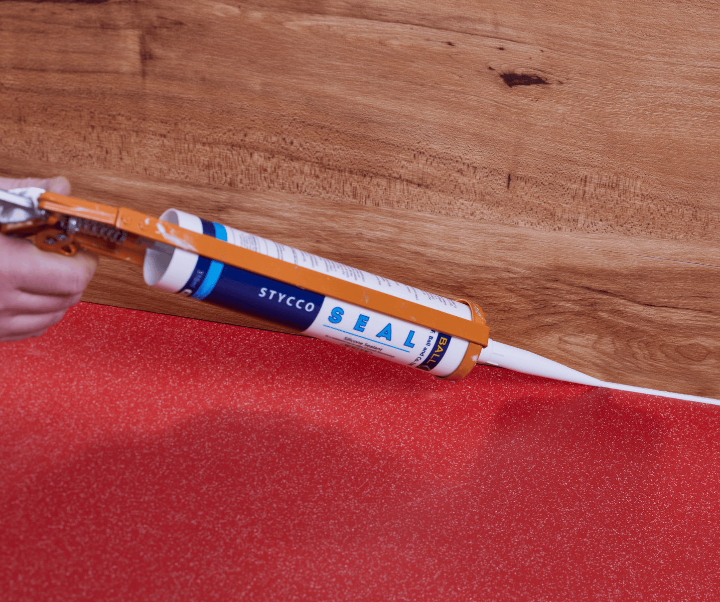 F-Ball Stycco Seal sealing a vinyl floorcovering joint