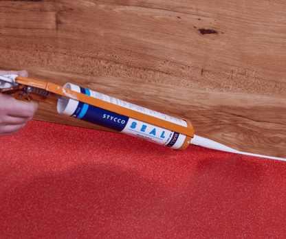 F-Ball Stycco Seal sealing a vinyl floorcovering joint