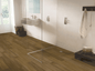 Sussex Range Smart 30 Natural luxury vinyl flooring installed in contemporary shower room showing natural wood effect