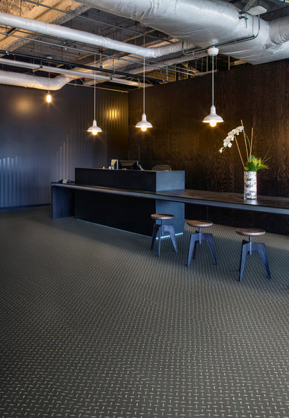 Black Treadplate - Polyflor Expona Design room setting