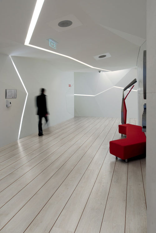 Polyflor Walnut 2059 marquetry strip installed within flooring. Listing is a pack of 50 strips; surrounding flooring, furniture and fittings are not included.