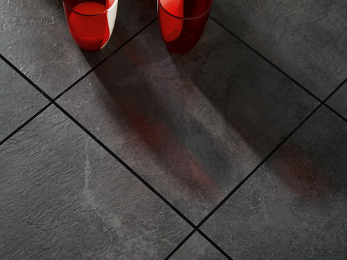 Polyflor Black 0028 feature strips installed between LVT; surrounding flooring and props sold separately