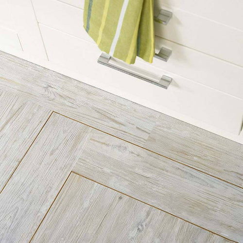 Polyflor Classic Oak 2058 marquetry strip installed as an LVT border; surrounding flooring sold separately