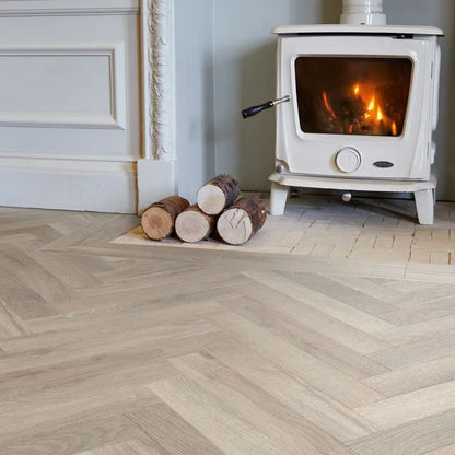 Polyflor Camaro PUR Waterside Oak parquet LVT LPQ2256 installed in modern interior