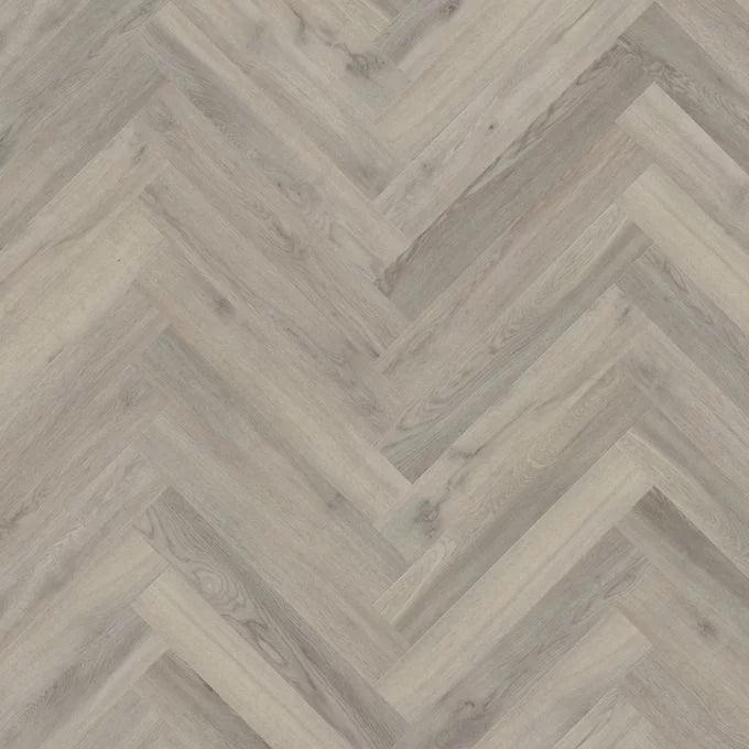 Close-up of Westchester Oak large parquet LVT flooring texture wood grain detail