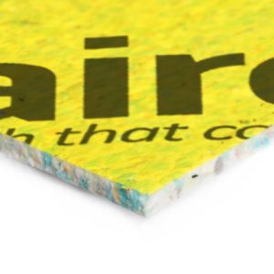 A close-up of a textured surface with the word 'air' visible, suggesting part of a larger phrase or logo on a colorful background.